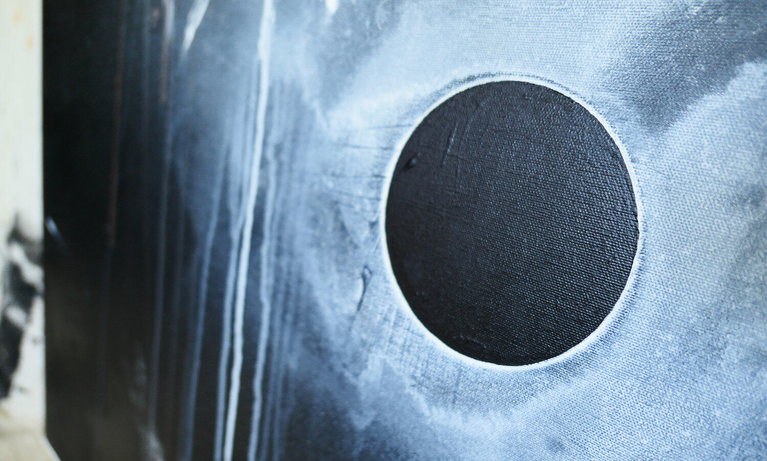 Dark eclipse-inspired painting with a black void and a striking white explosion of paint on a cosmic backdrop.